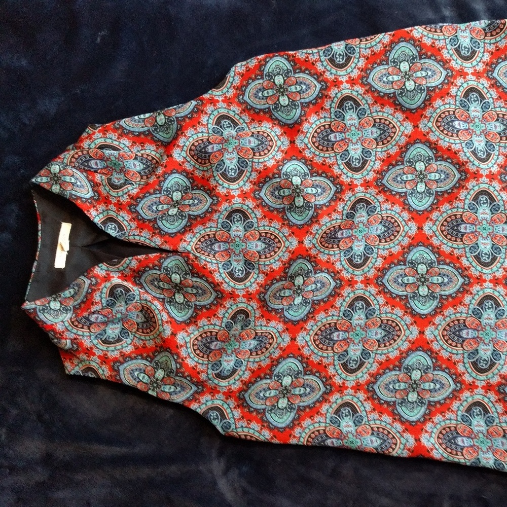 Stunning orange and blue blouse